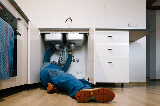 Professional Drain Cleaning technician working in Leitchfield, KY